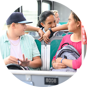 Three teenagers on AC Transit Bus